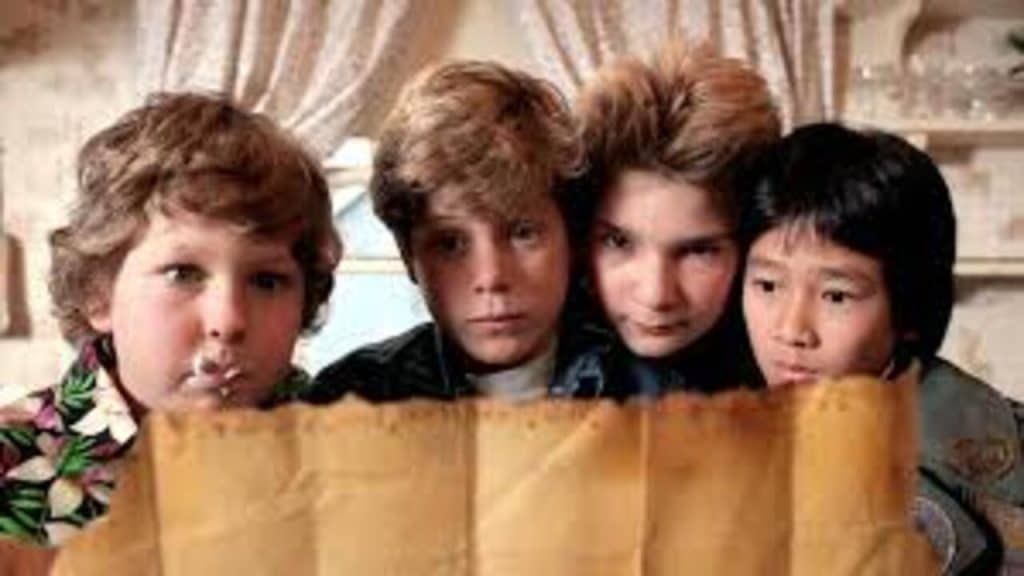 A group of kids looking at a map.