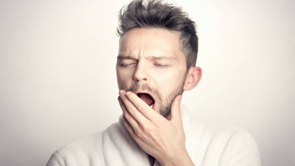 A man yawning