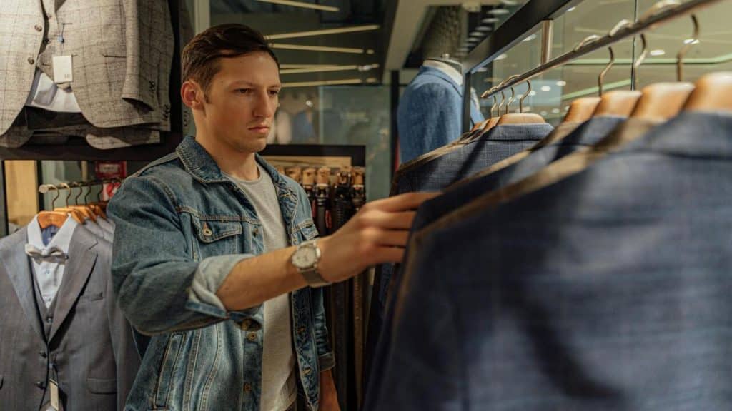 A man shopping for clothes.