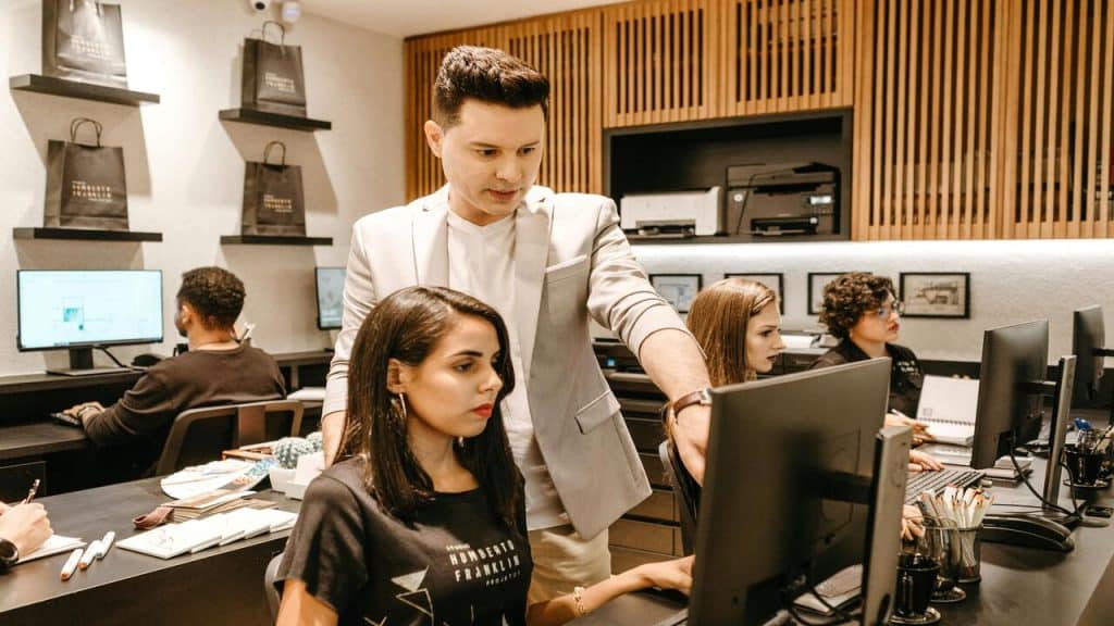 A boss training his employees.