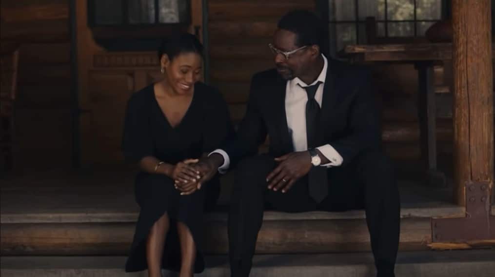 A picture of Randall talking with a woman.