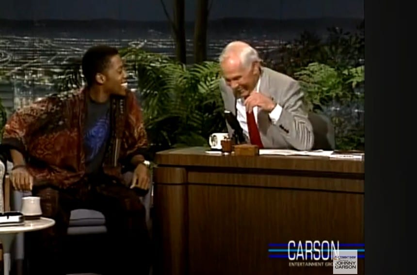A picture of Dwayne Wayne on the interview with Carson.