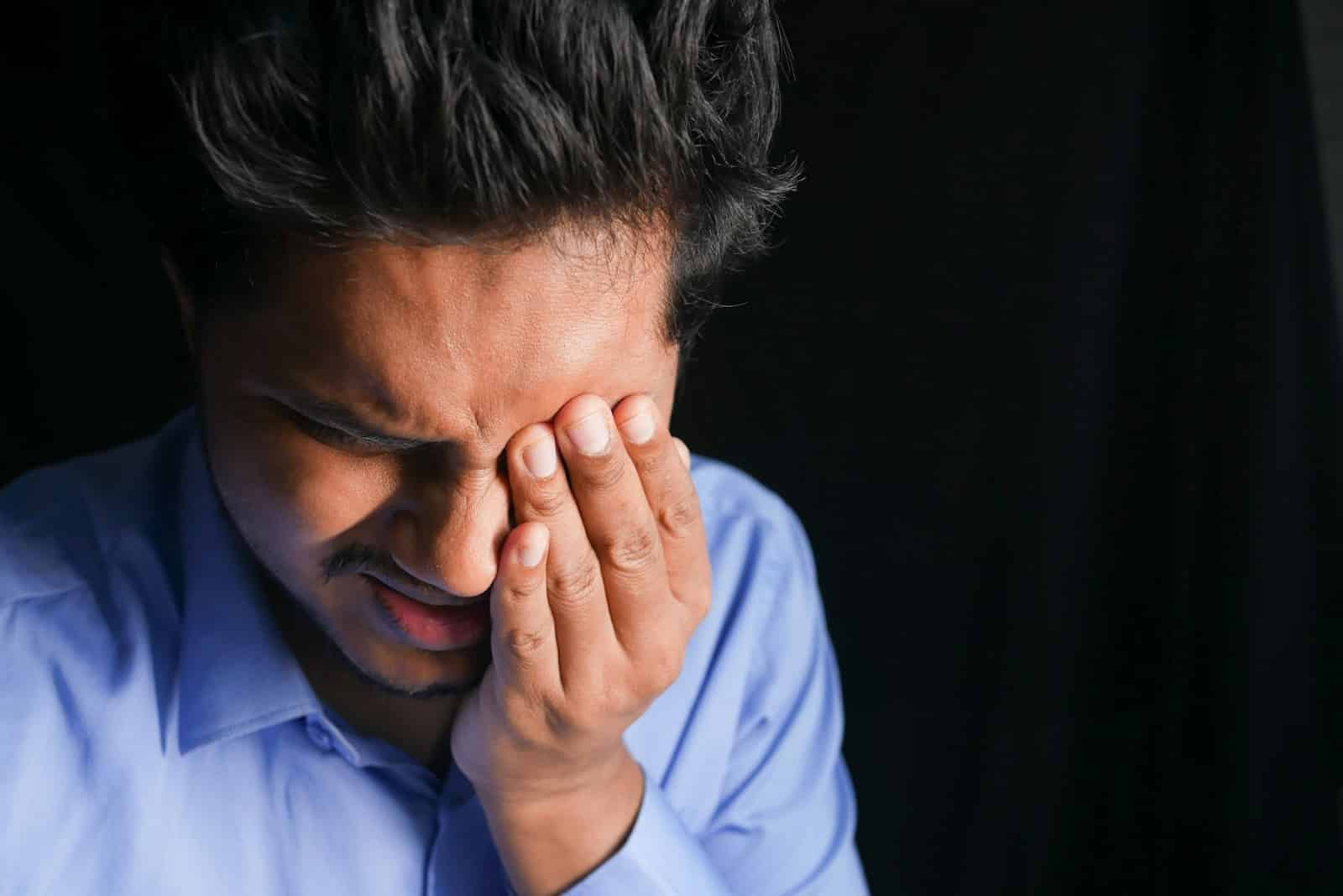 A man having a headache.