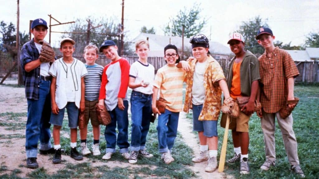 A group of kids posing for the camera.