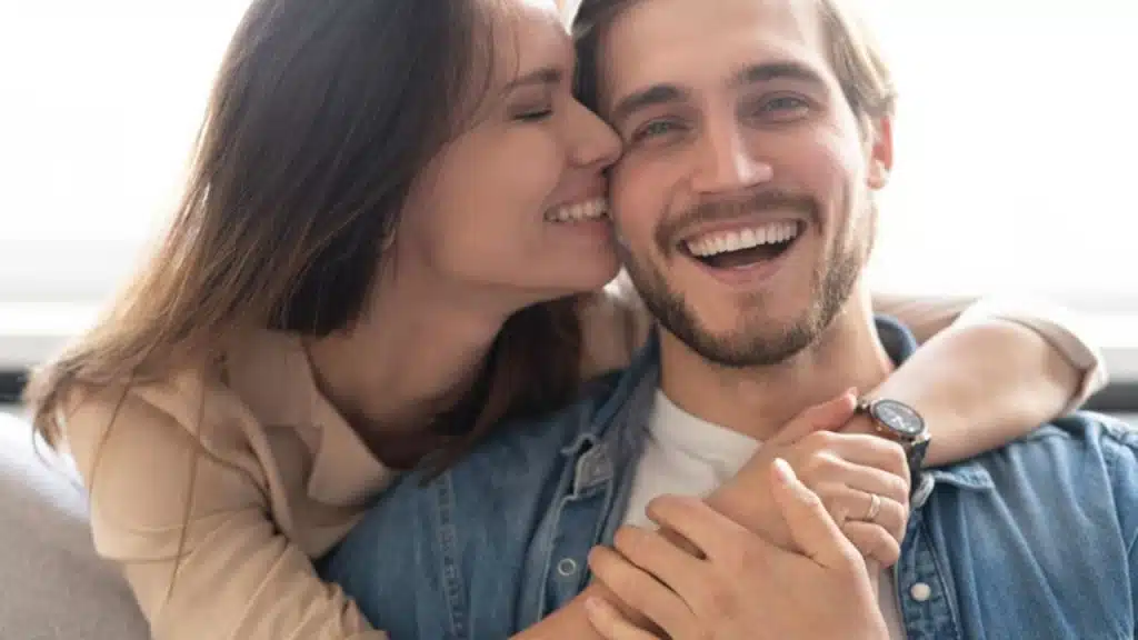Happy couple smiling together in a moment of genuine connection