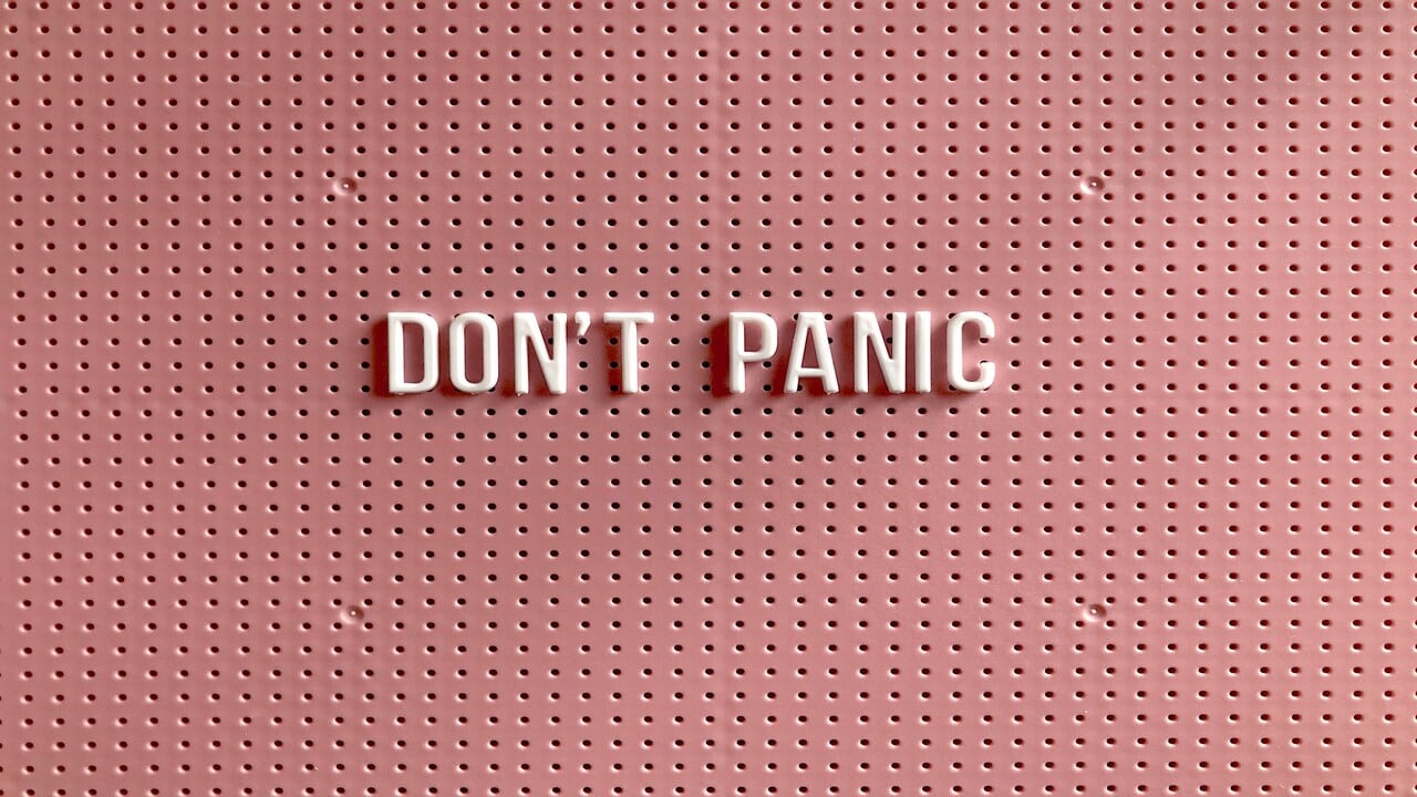 Plastic words spelling out “don’t panic”.