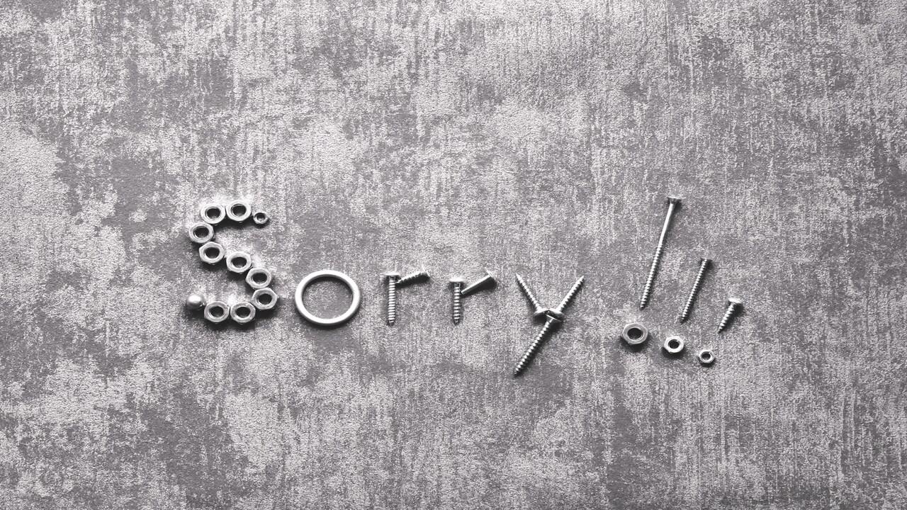 Tools spelling out the word “sorry”.