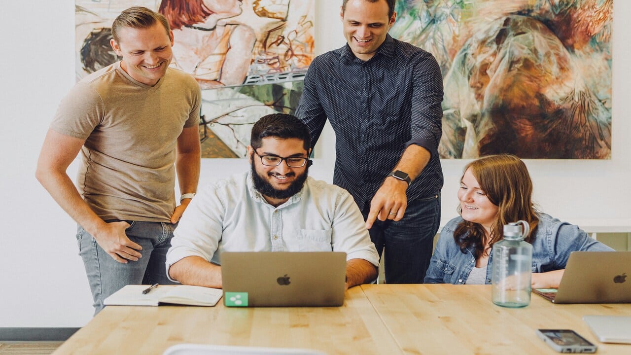 A person helping others at work.