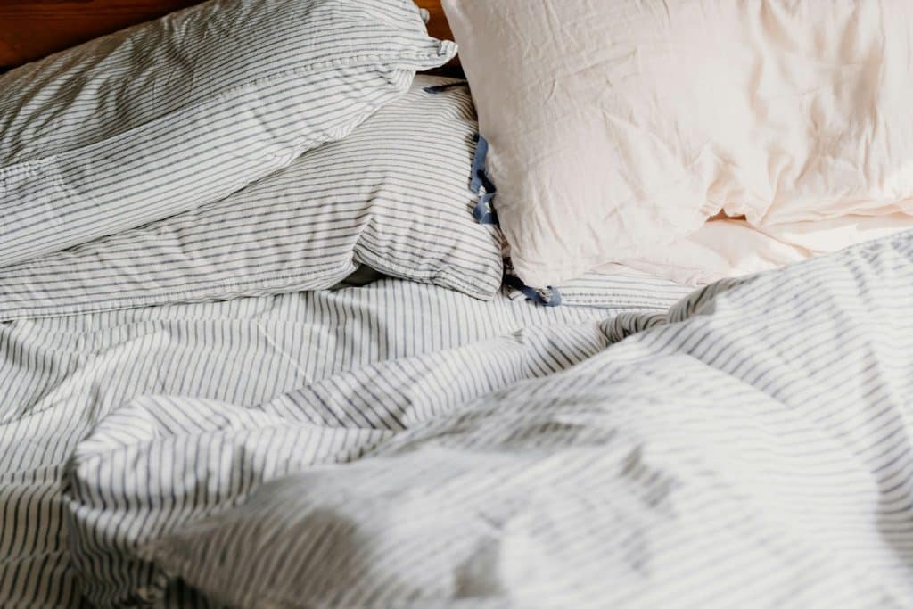 A picture of a pillow with pillowcases.