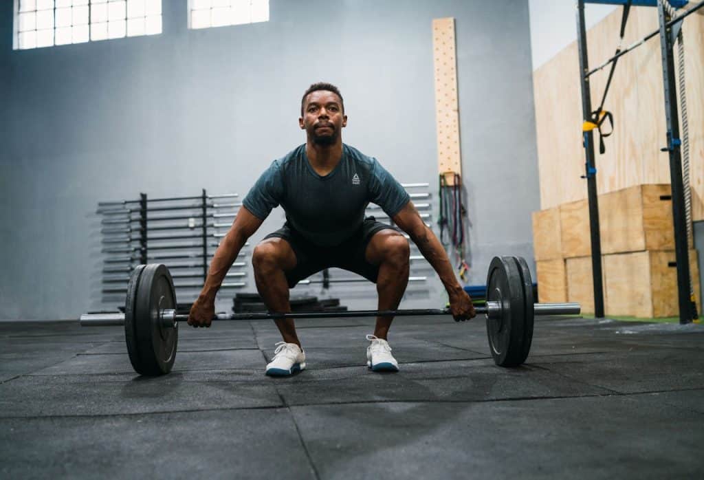 A man that will lift a barbell.