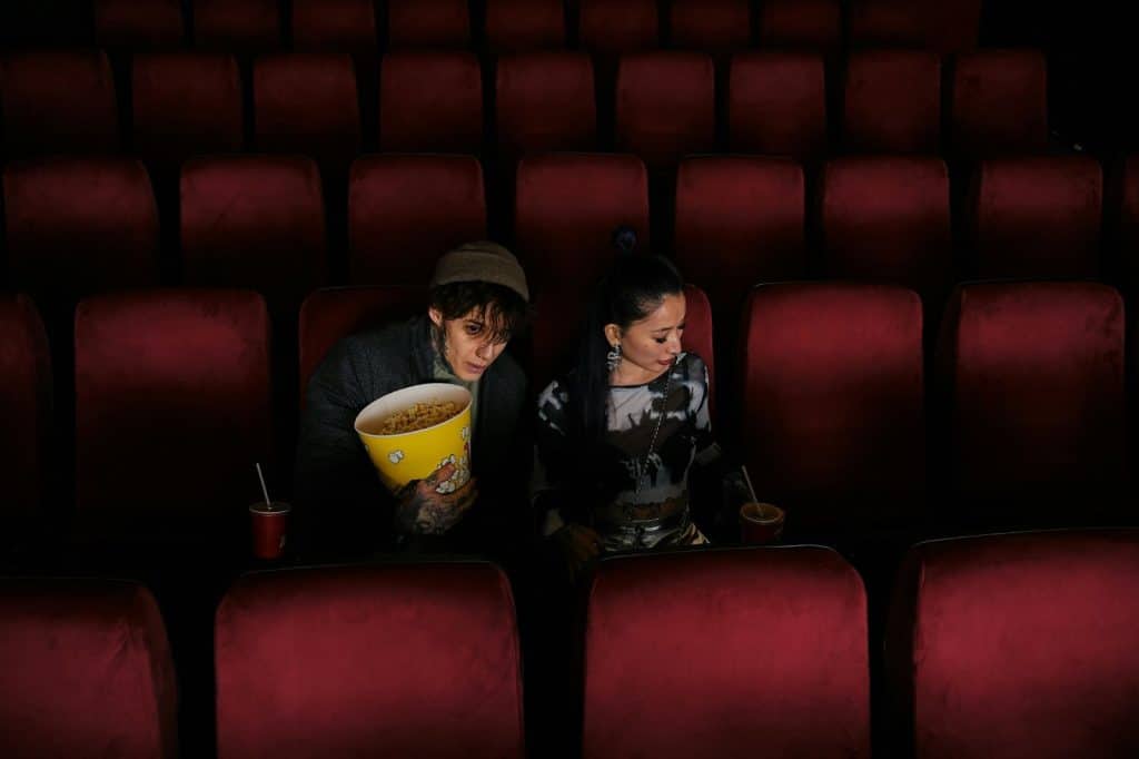A man and woman at the cinema.