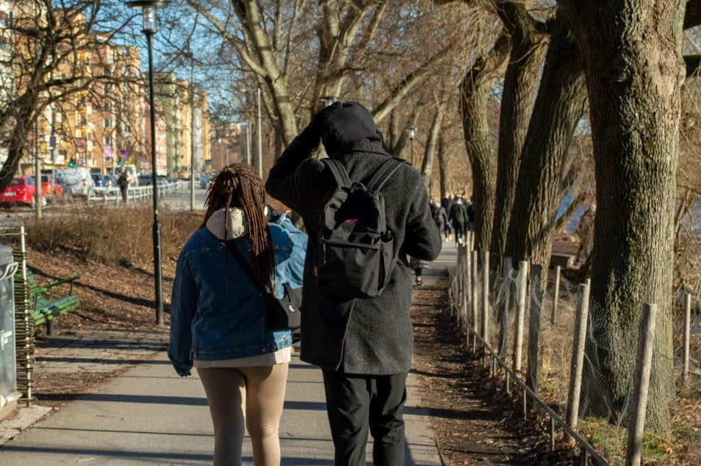A man and woman walking.