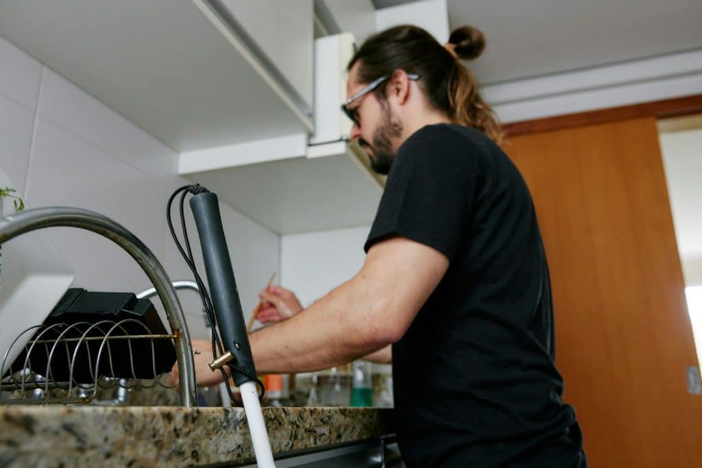 A man doing the dishes.