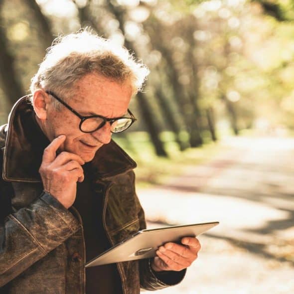An elderly man at the park
