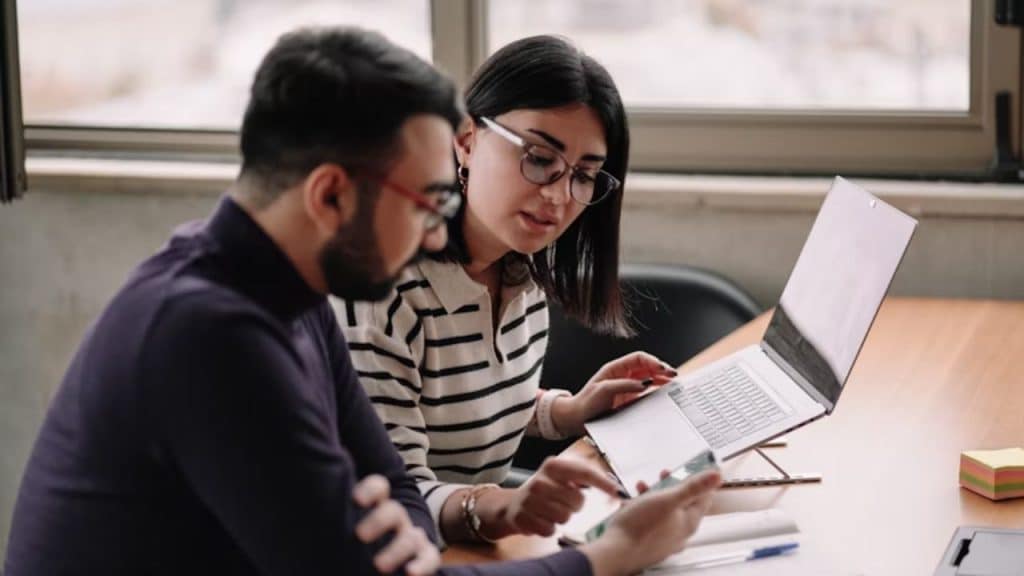 Couple resolving financial differences respectfully at home.