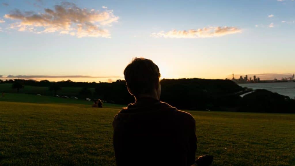 Man in solitude reflecting on personal growth