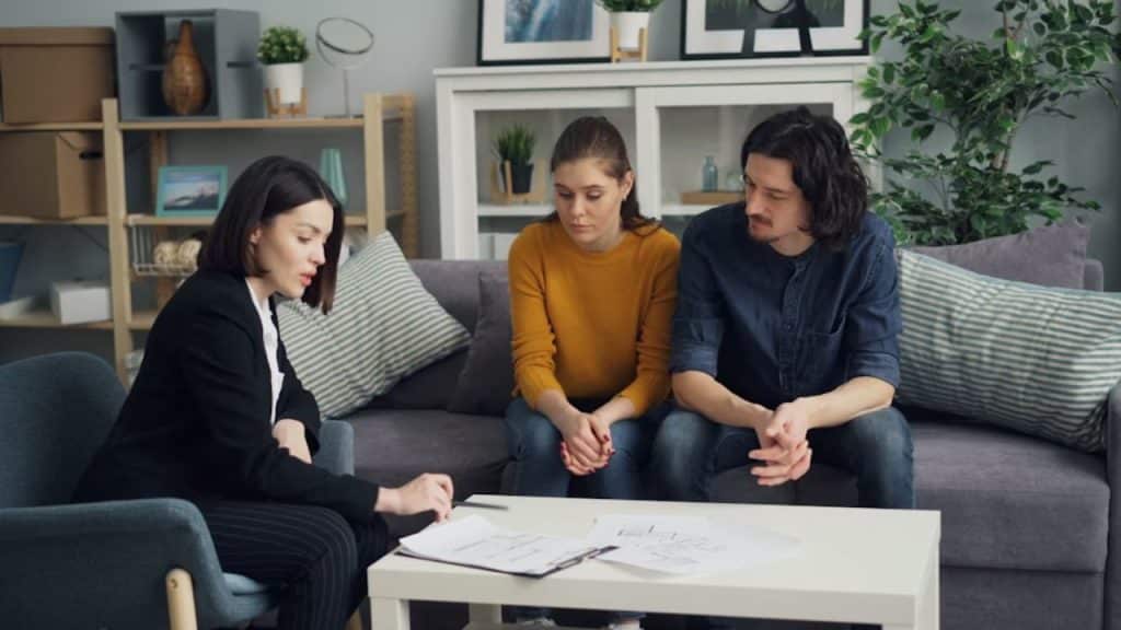 Couple reviewing a financial plan with a financial advisor.