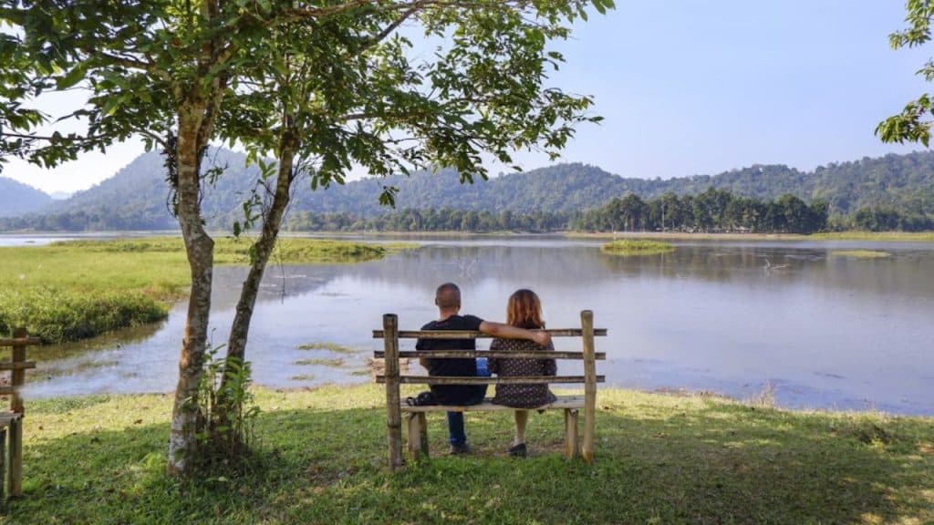 Couple sitting peacefully in nature