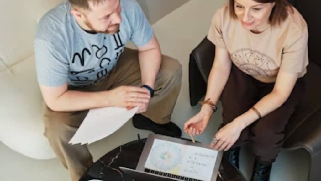 Couple in therapy session discussing financial compatibility.