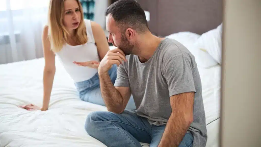 Man vulnerably opening up about his emotions during a conversation.