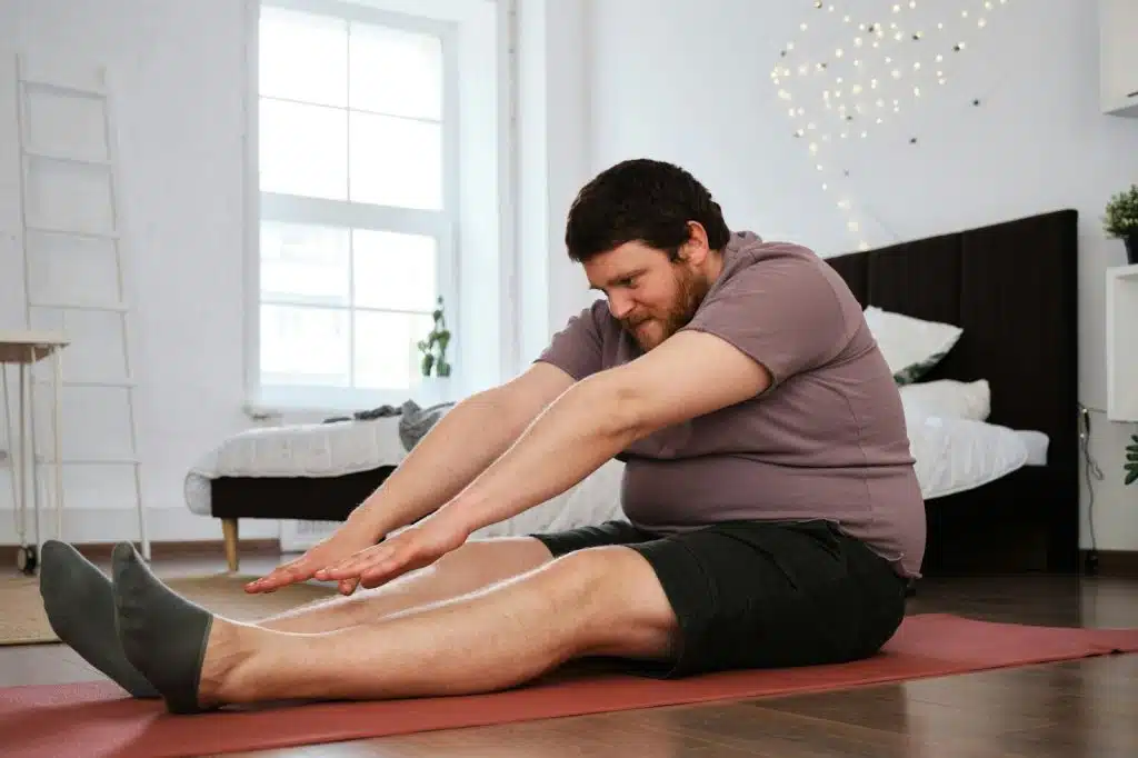 A man stretching.