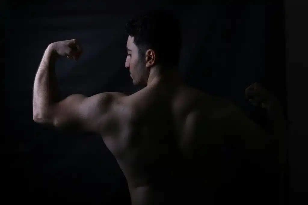 A man flexing his biceps.