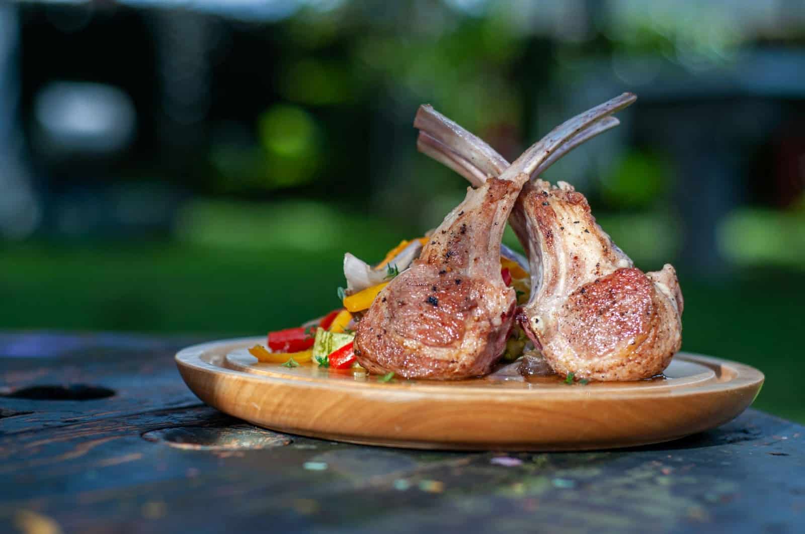 A picture of a dish of lamb chops.