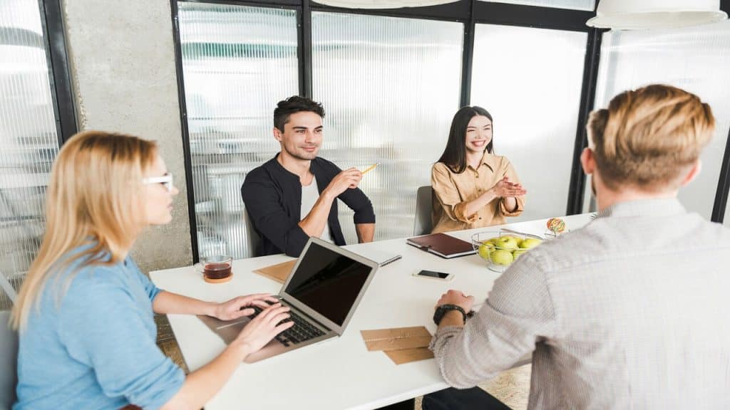 A group of colleagues at a work meeting