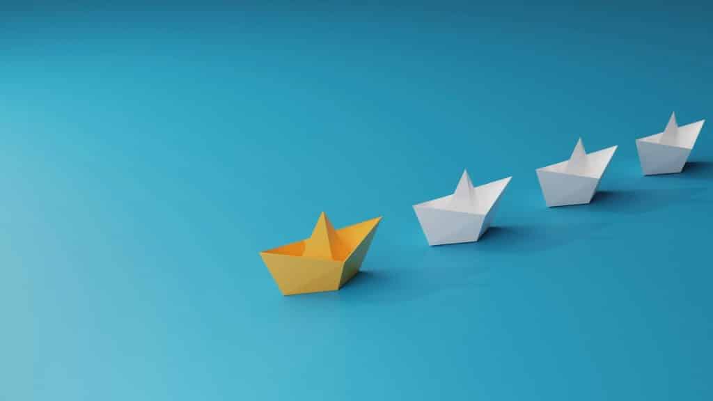 Yellow boat leading white boats