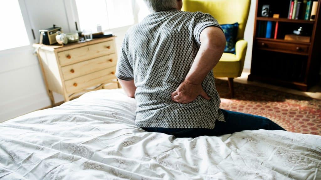 A man experiencing back pain