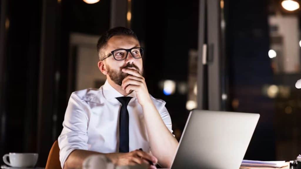 Man alone reflecting on emotional baggage and personal growth