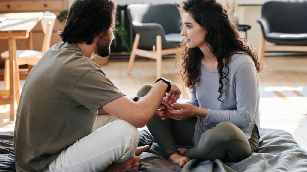 Man opening up during a conversation at home