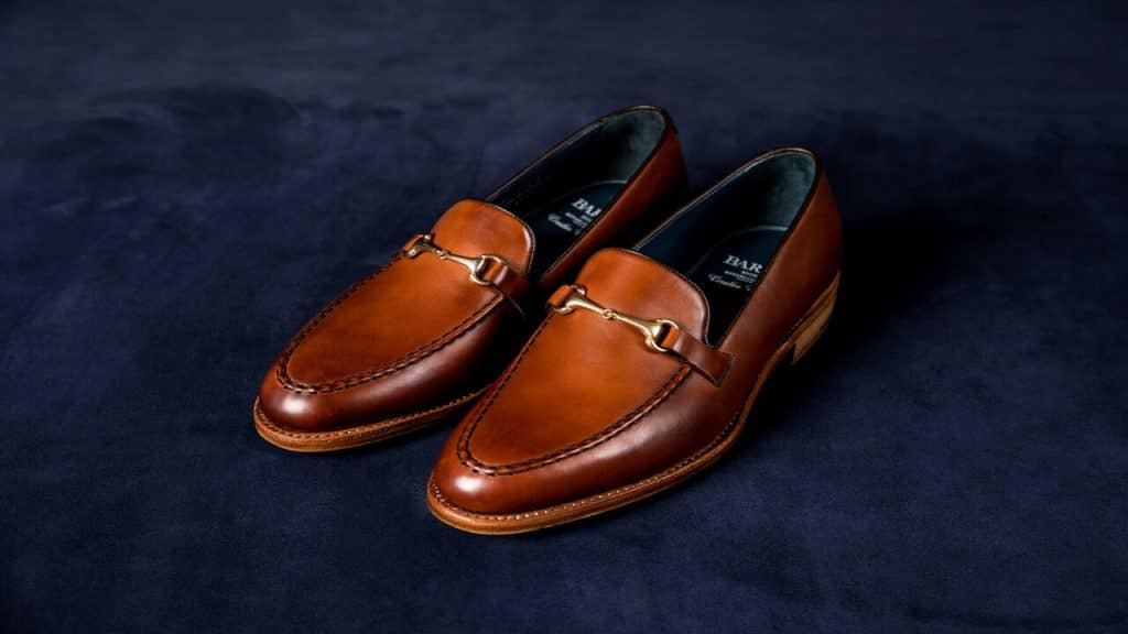 A pair of brown loafers.