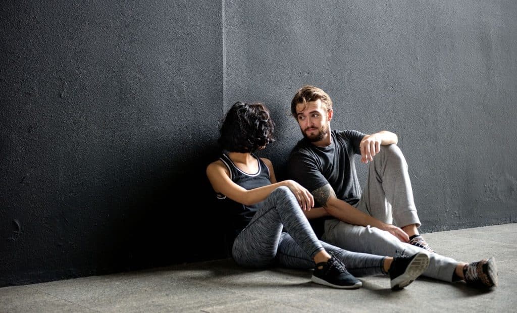 A man looking at a woman