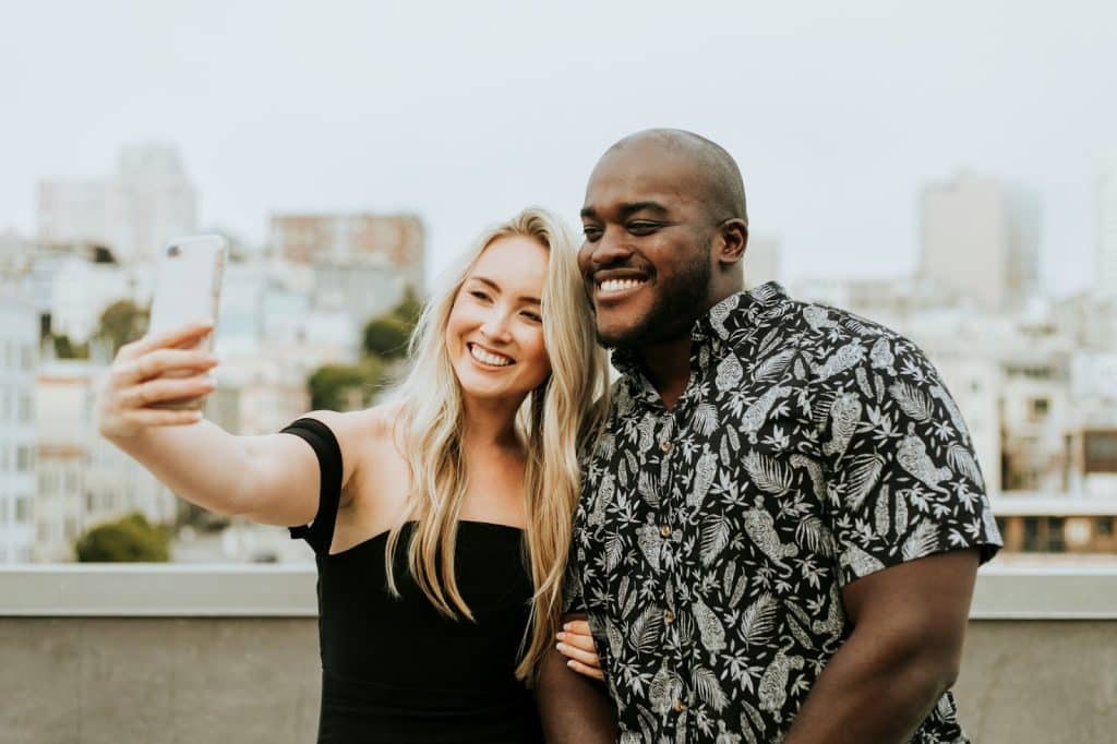 A man and woman taking a picture together 