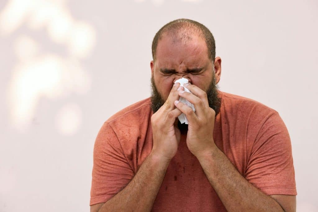 A man sneezing
