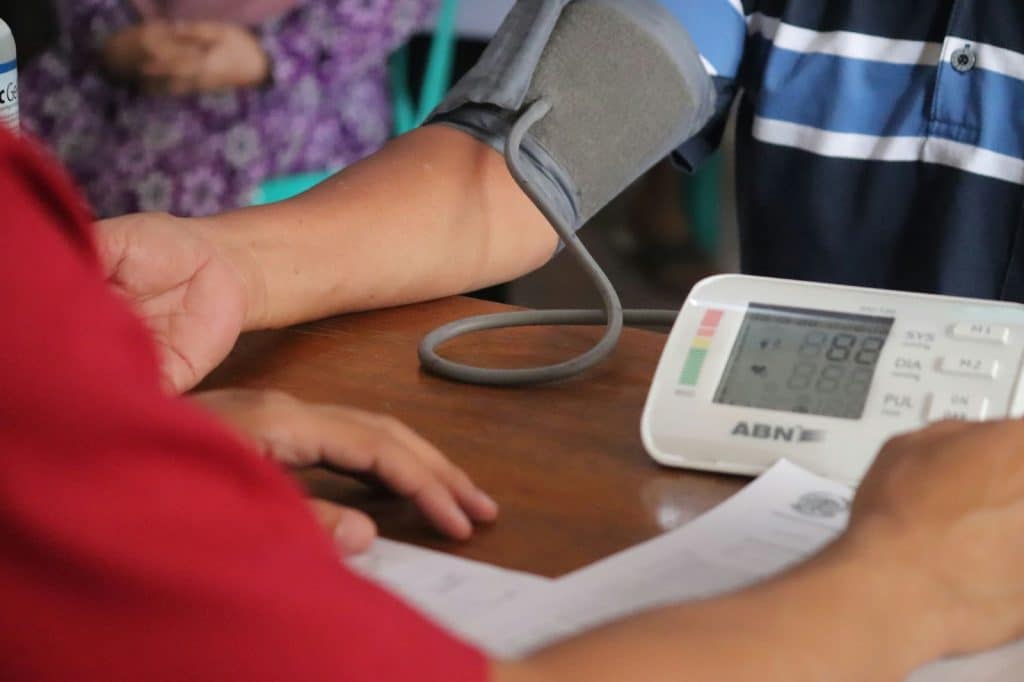 A man getting a blood pressure check-up