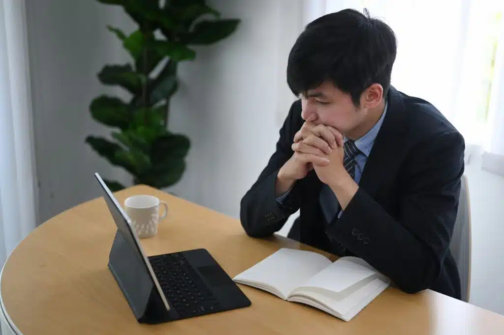 A man just looking at his tablet