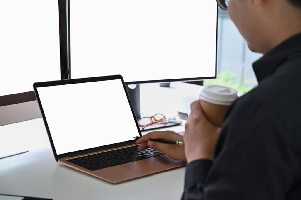 A man with a multiple screens on his front