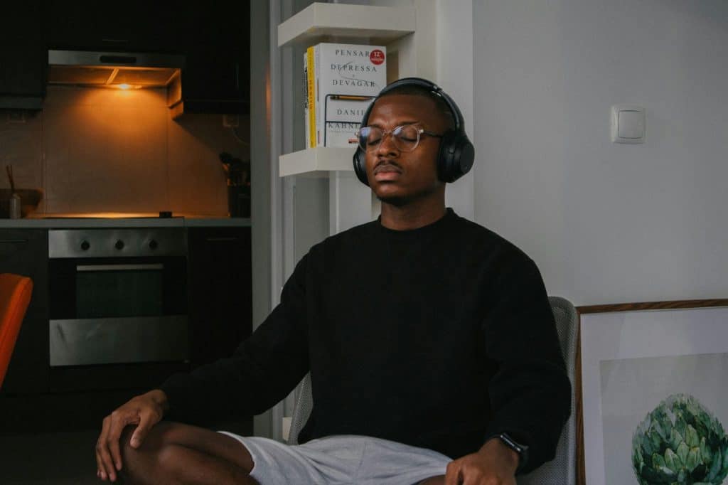 A man with close eyes and listening