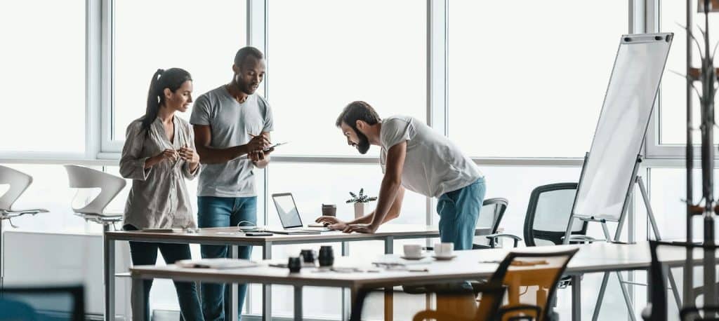 A man working with his colleagues