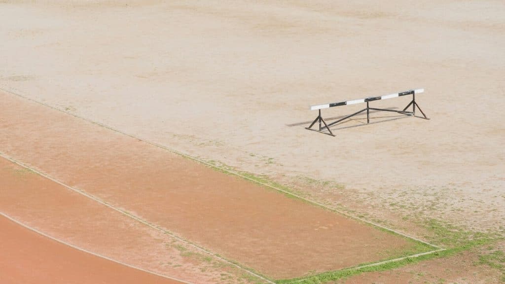 A black and white hurdle on an obstacle course.