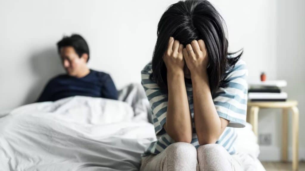 Couple feeling distant due to emotional barriers caused by games