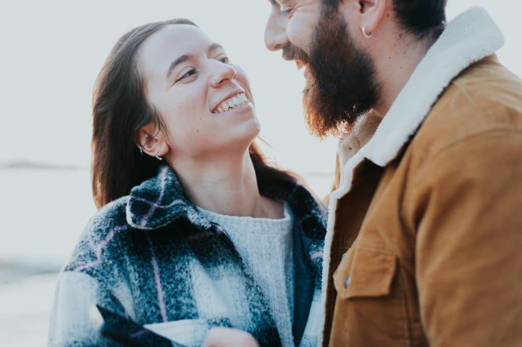A man and woman looking at each other