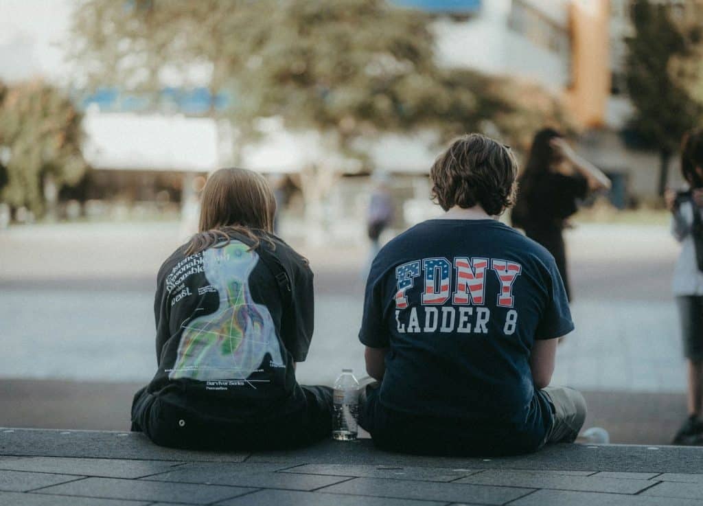 A man and woman sitting next to each other