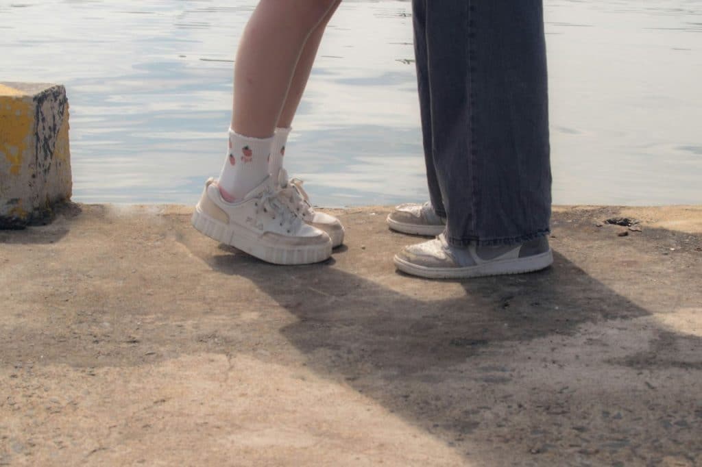 A man and woman’s foot