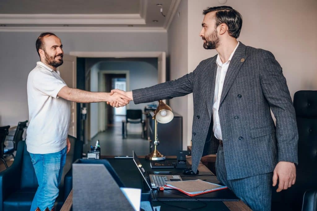 Two men shaking hands