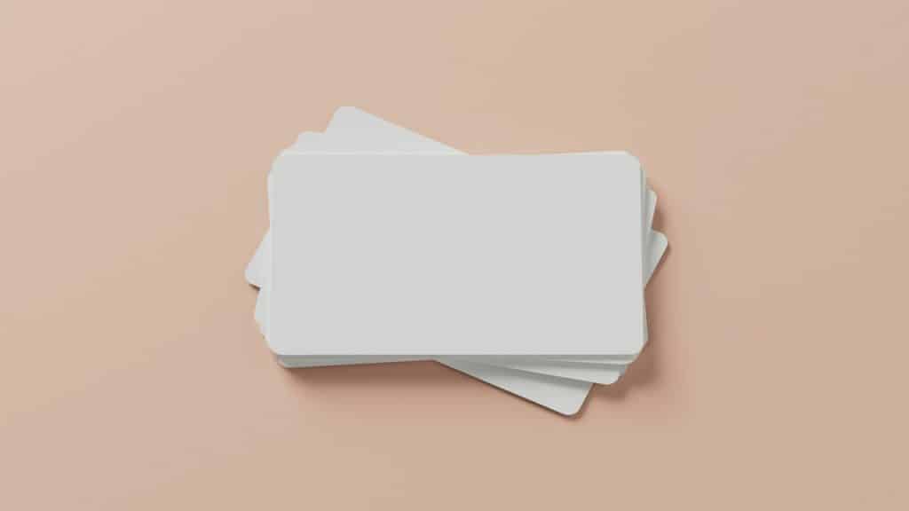 Blank flashcards on a pink background.