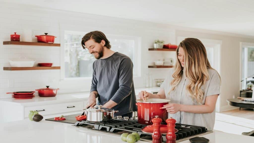 A couple cooking together