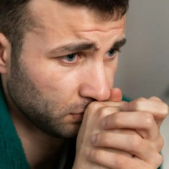 A man just staring at nowhere